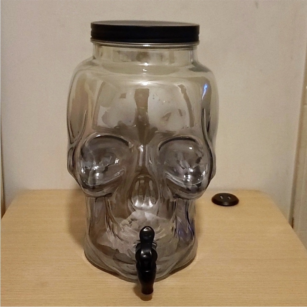Glass skull beverage dispenser